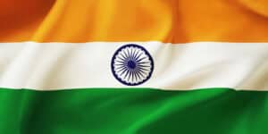 Vibrant Indian flag with saffron, white, green stripes and navy blue Ashoka Chakra, symbolizing Indian pride and heritage.
