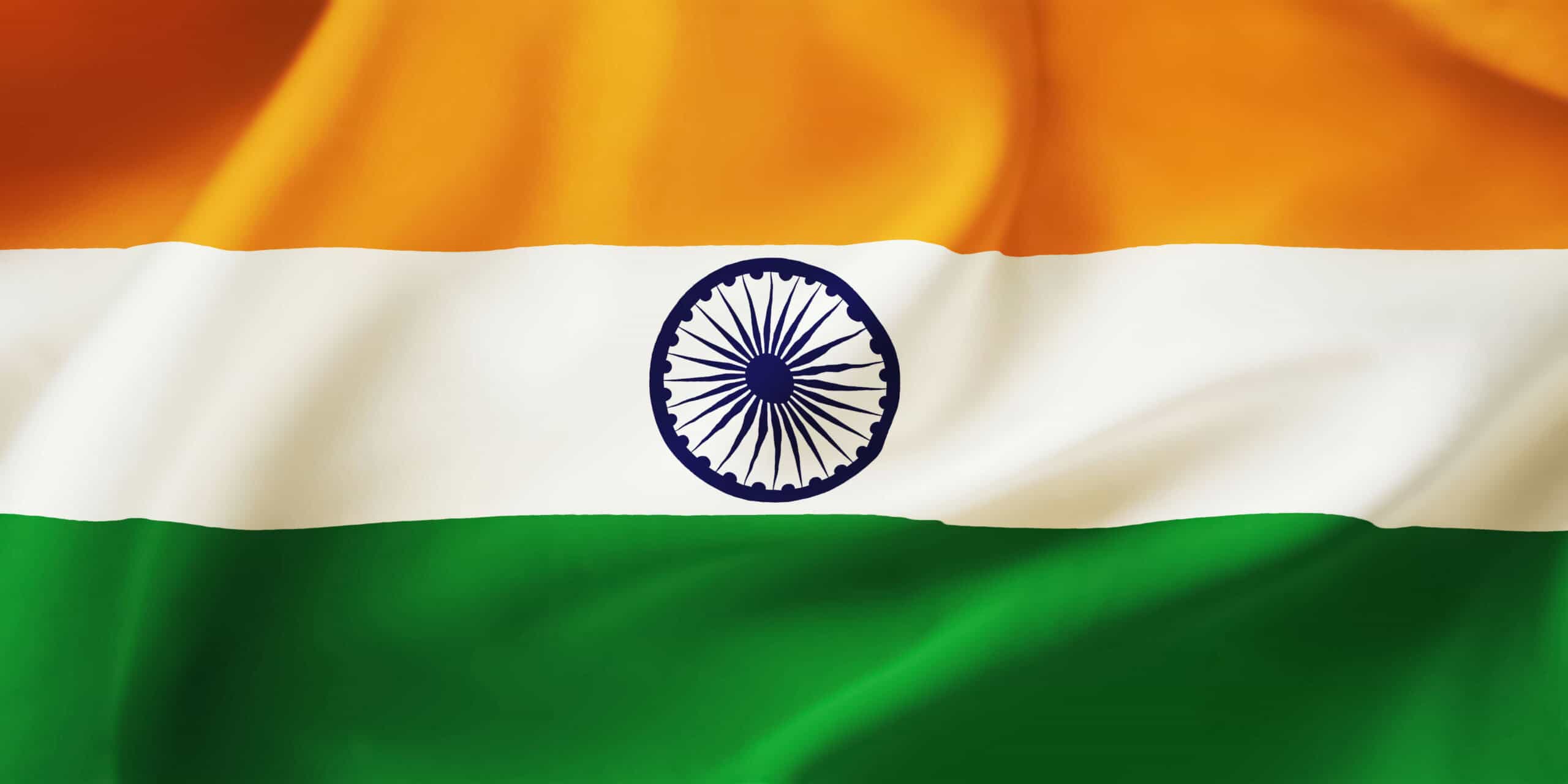 Vibrant Indian flag with saffron, white, green stripes and navy blue Ashoka Chakra, symbolizing Indian pride and heritage.