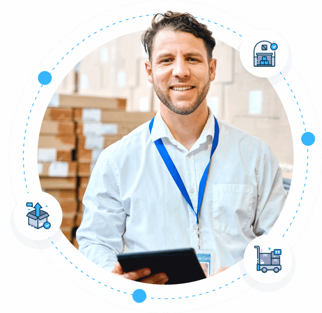 Warehouse staff working with inventory management system in distribution centre.