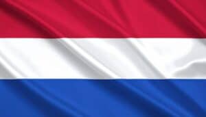 Netherlands national flag with horizontal red, white, and blue stripes representing liberty and national pride.